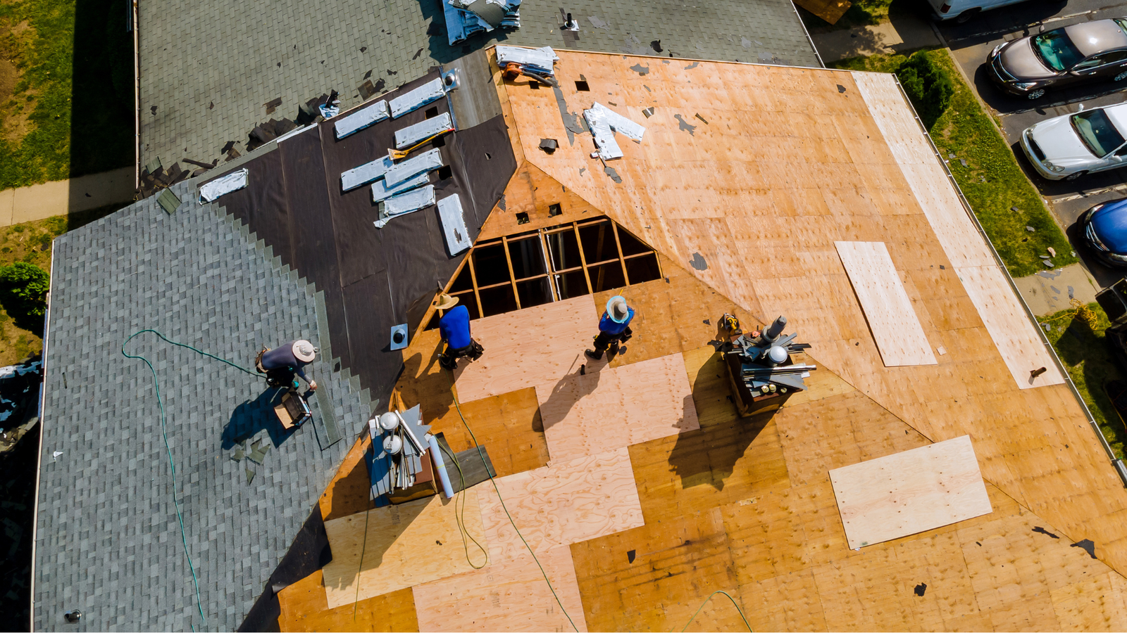 J4 Roofing Contractors during a roof replacement service