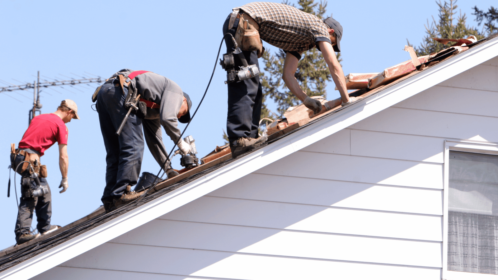 Roofing experts during a roof replacement