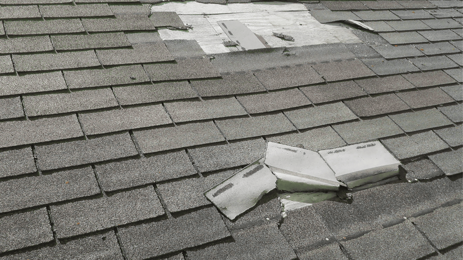 Storm-Damaged Shingle Roofing